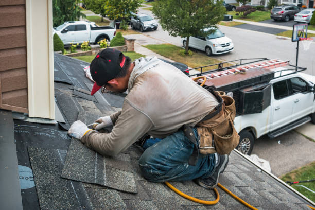 Professional Emergency Roof Repair technician working in Wyandanch, NY
